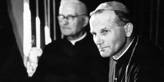 Krakow Auxiliary Bishop Karol Jozef Wojtyla, the future Pope John Paul II, is pictured with priests in an undated photo. He was ordained a bishop in 1958 at age 38, then Poland's youngest bishop. He will be canonized April 27 with Blessed John XXIII. (CNS photo) (March 20, 2014) See stories SAINTS- to come.